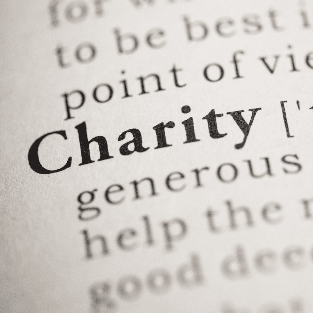 Charity written in newspaper print