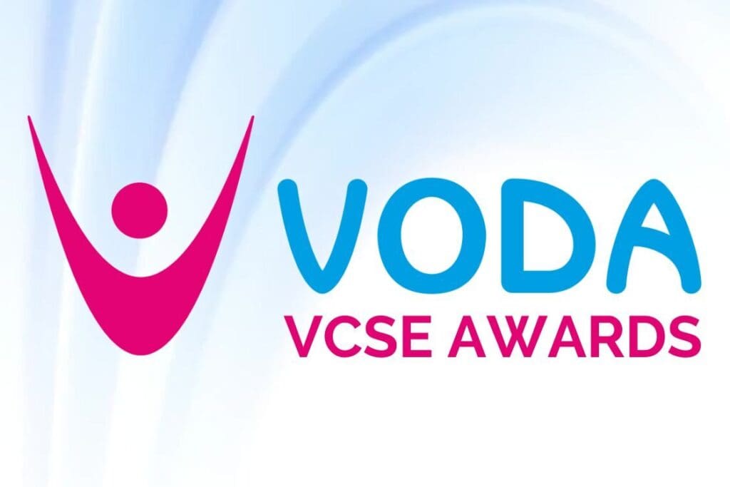 VODA VCSE Awards Logo with blue swirl background