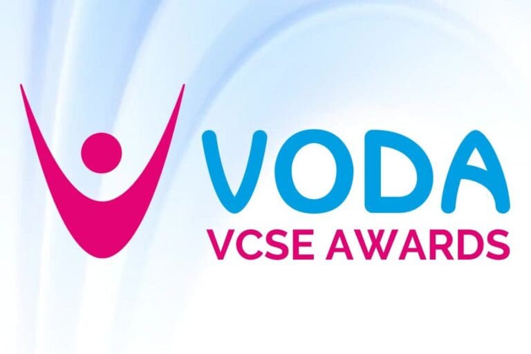 VODA VCSE Awards Logo with blue swirl background