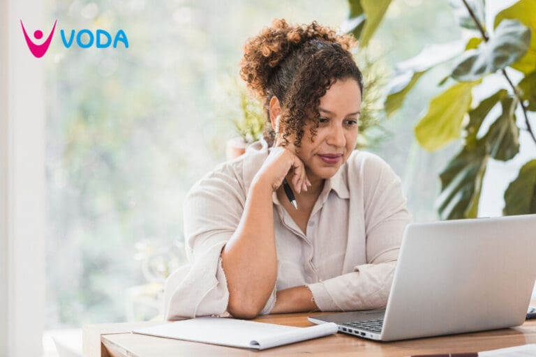 Employee Reading on a Laptop