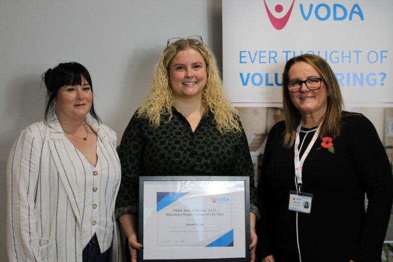 Salute Her - organisation of the year accepting their award