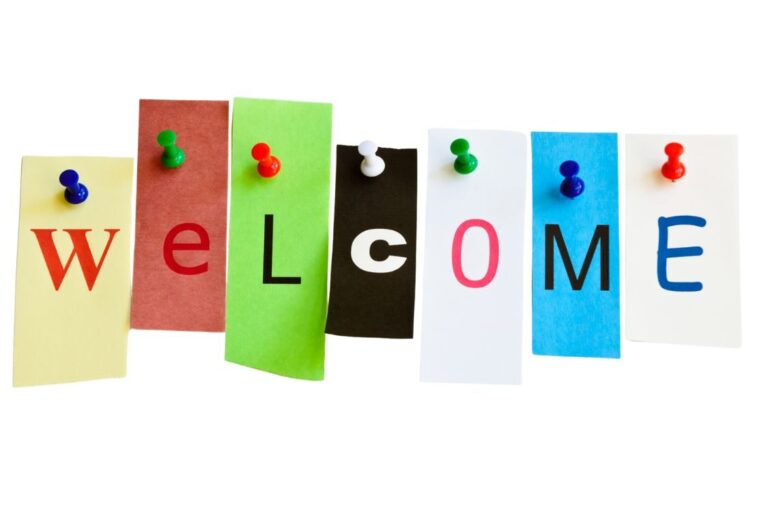 Welcome letters pinned on board
